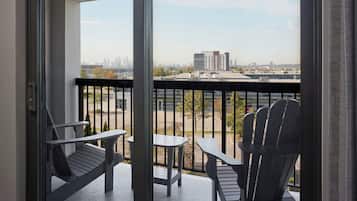 Desk, laptop workspace, blackout drapes, iron/ironing board