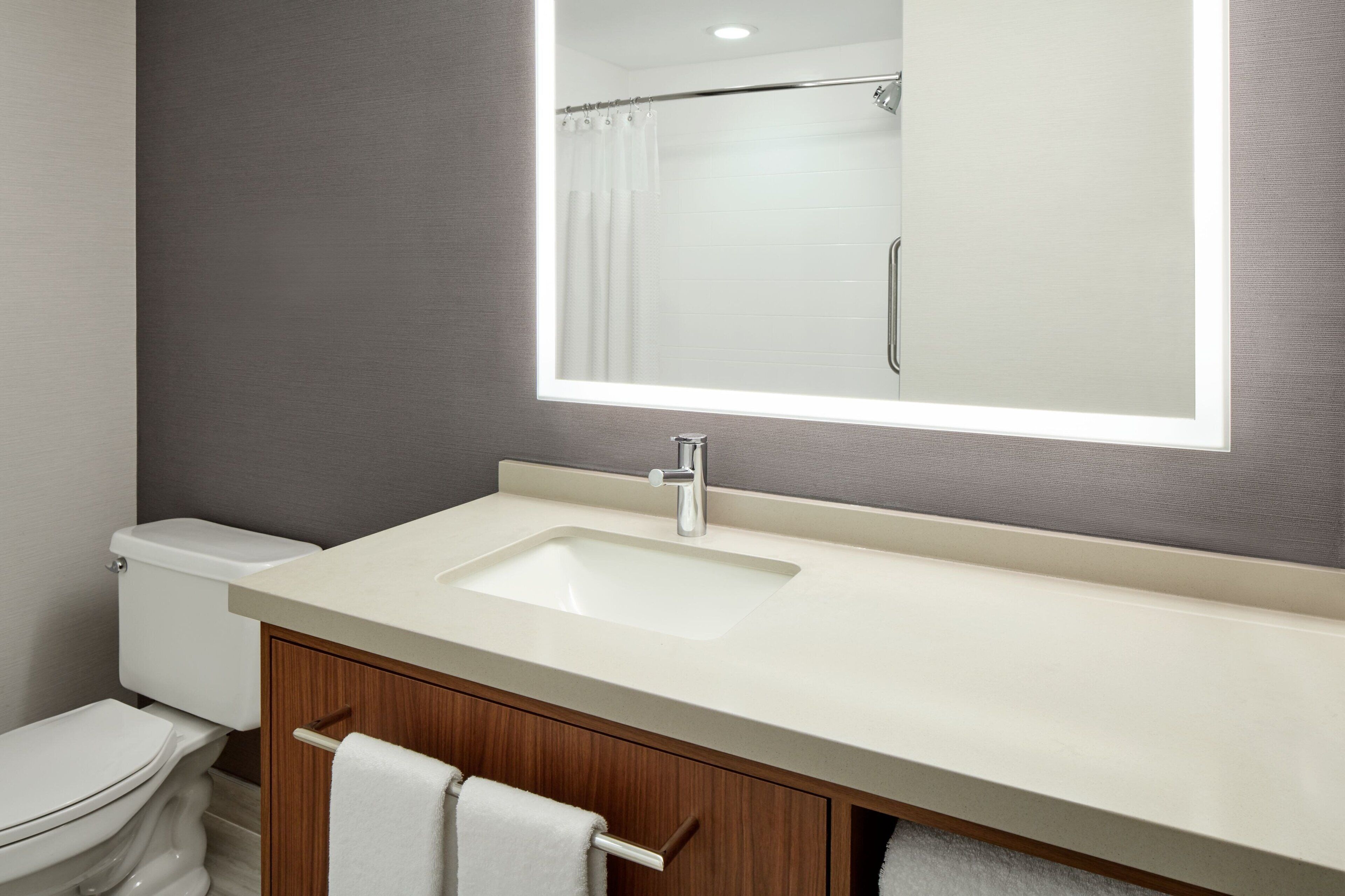 combined shower/bathtub, eco-friendly toiletries, hair dryer, towels