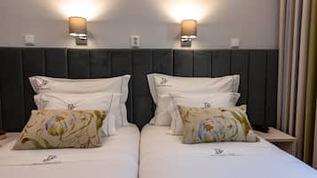 Egyptian cotton sheets, premium bedding, down comforters, minibar