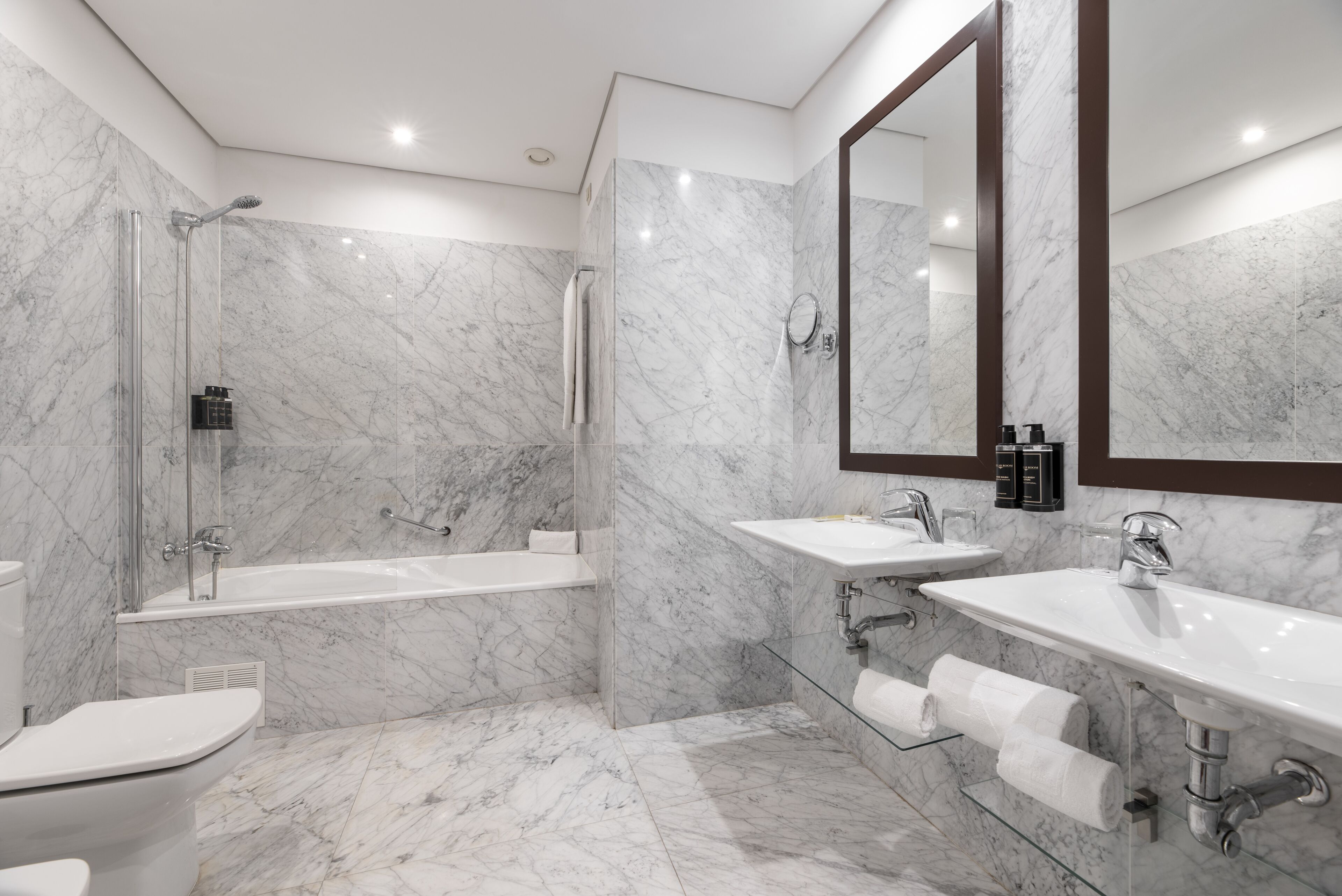 eco-friendly toiletries, hair dryer, bidet, towels