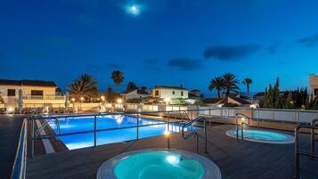 2 outdoor pools, pool umbrellas, pool loungers