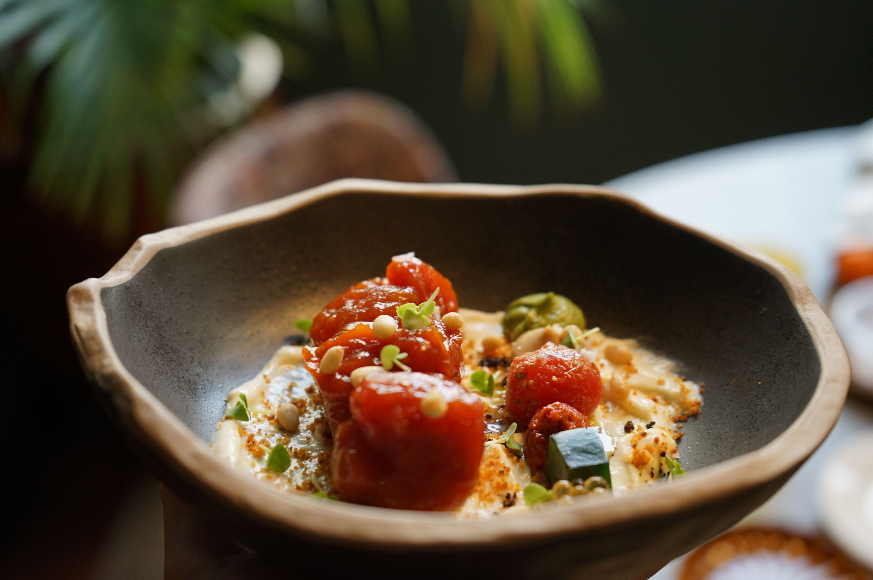 A bowl of food with various ingredients.