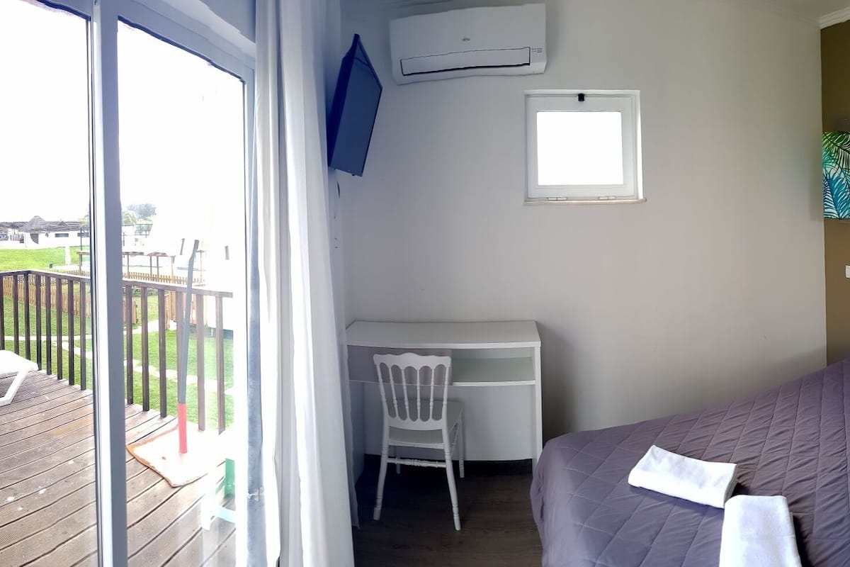 Bungalow, 1 Bedroom | 1 bedroom, in-room safe, blackout drapes, iron/ironing board