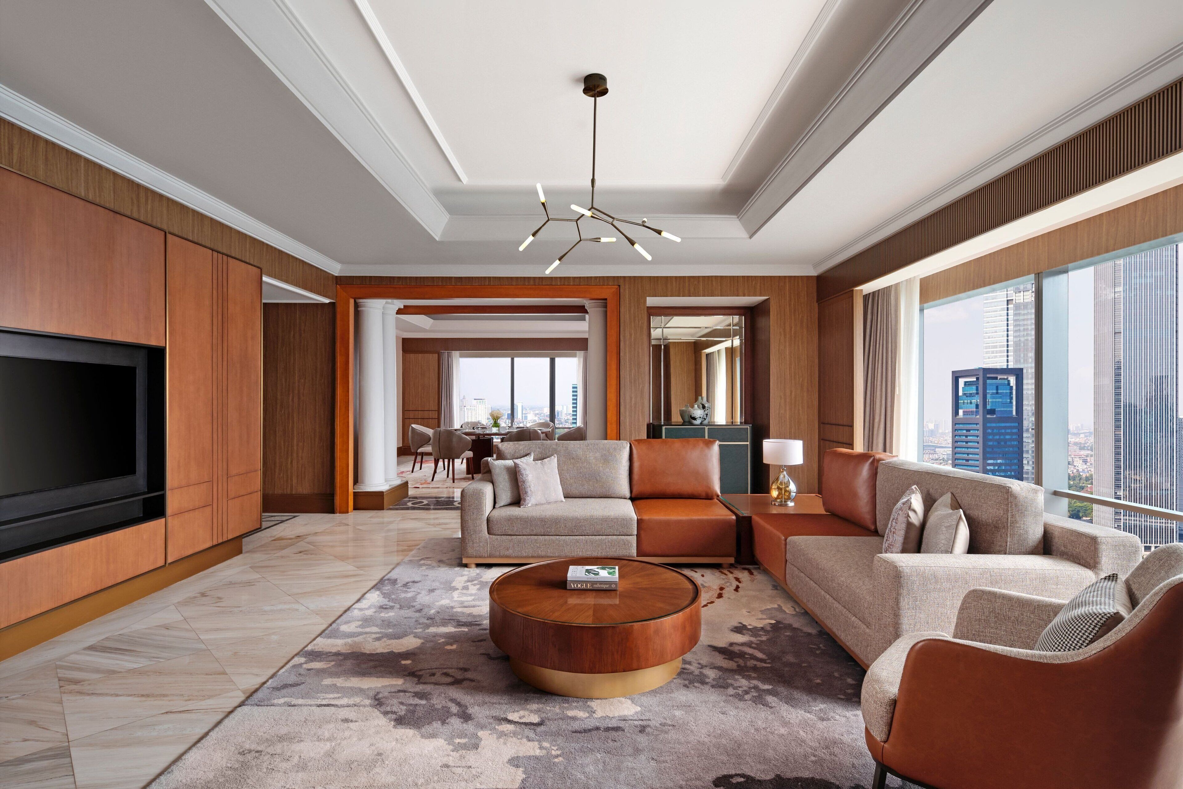 club suite, 1 king bed, non smoking, city view | living room | lcd tv, dvd player