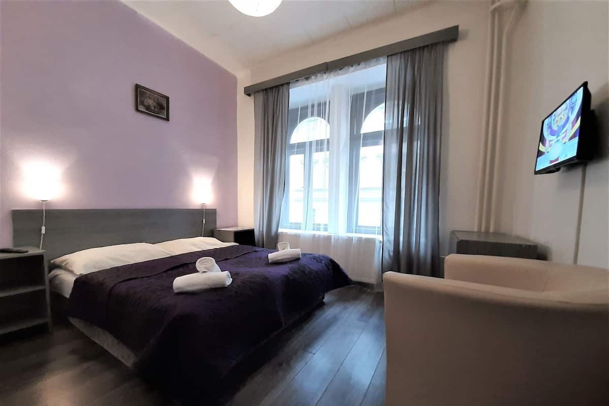 Blackout curtains, iron/ironing board, free WiFi, bed sheets