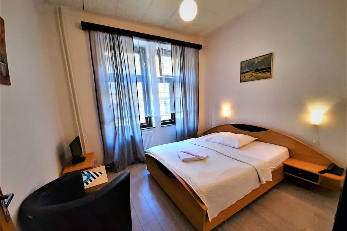 Blackout curtains, iron/ironing board, free WiFi, bed sheets