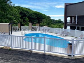 Seasonal outdoor pool, pool loungers
