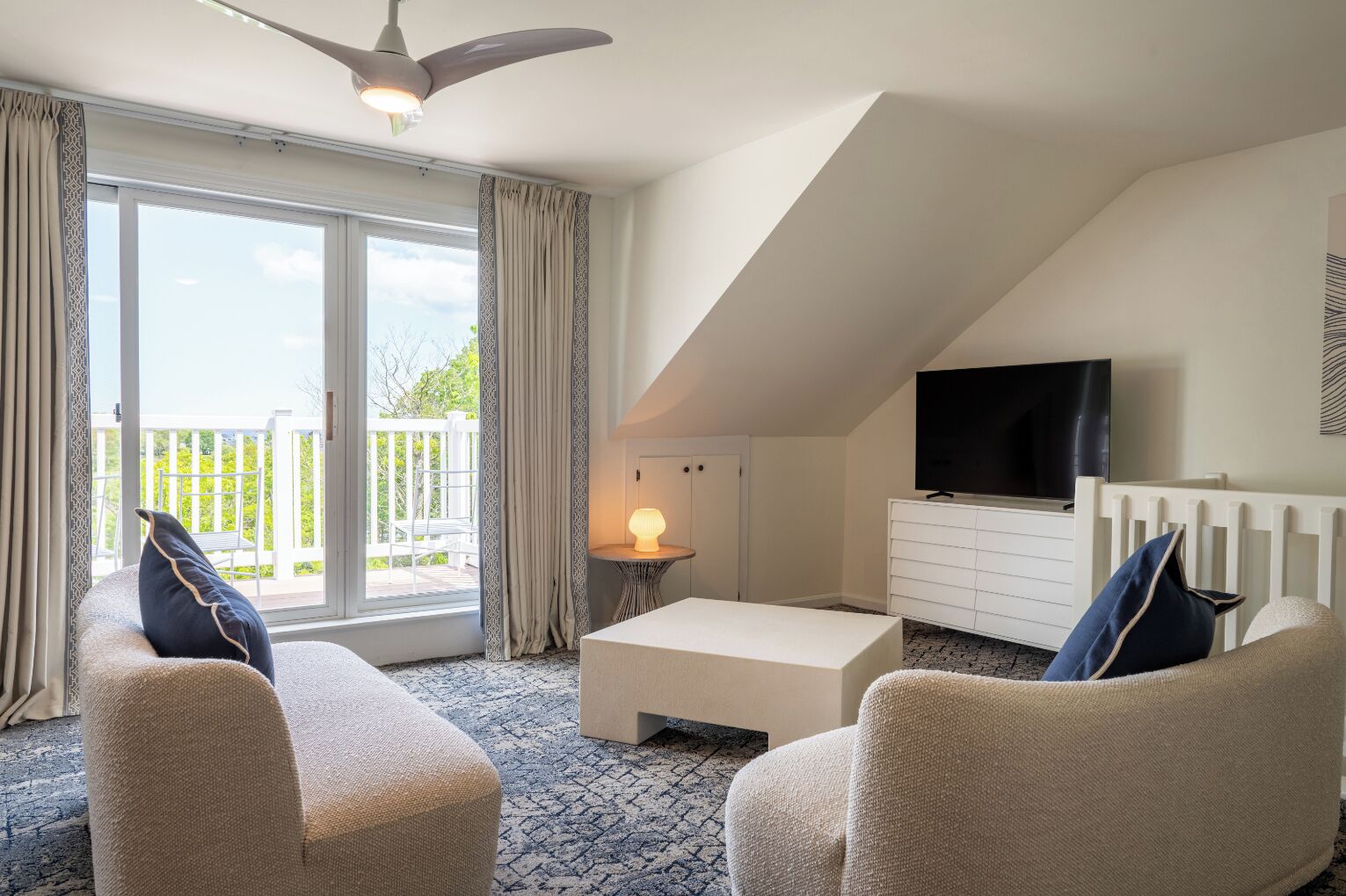 executive room, 2 bedrooms, balcony, river view | living area | 55-inch flat-screen tv with digital channels