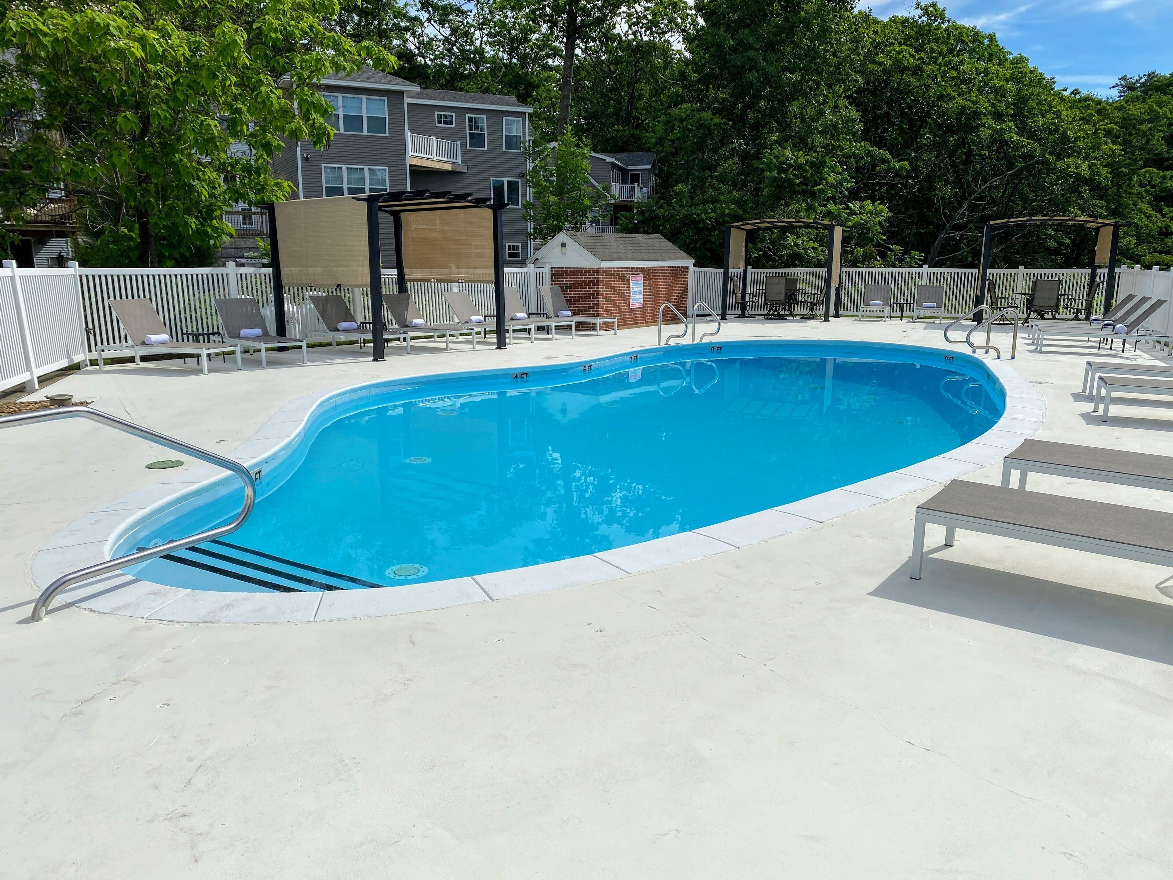 Seasonal outdoor pool, pool loungers