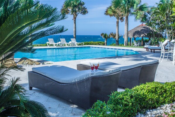 Luxury Villa, 5 Bedrooms, Oceanfront Villa Ataraxia | Outdoor pool | Outdoor pool, a natural pool, sun loungers