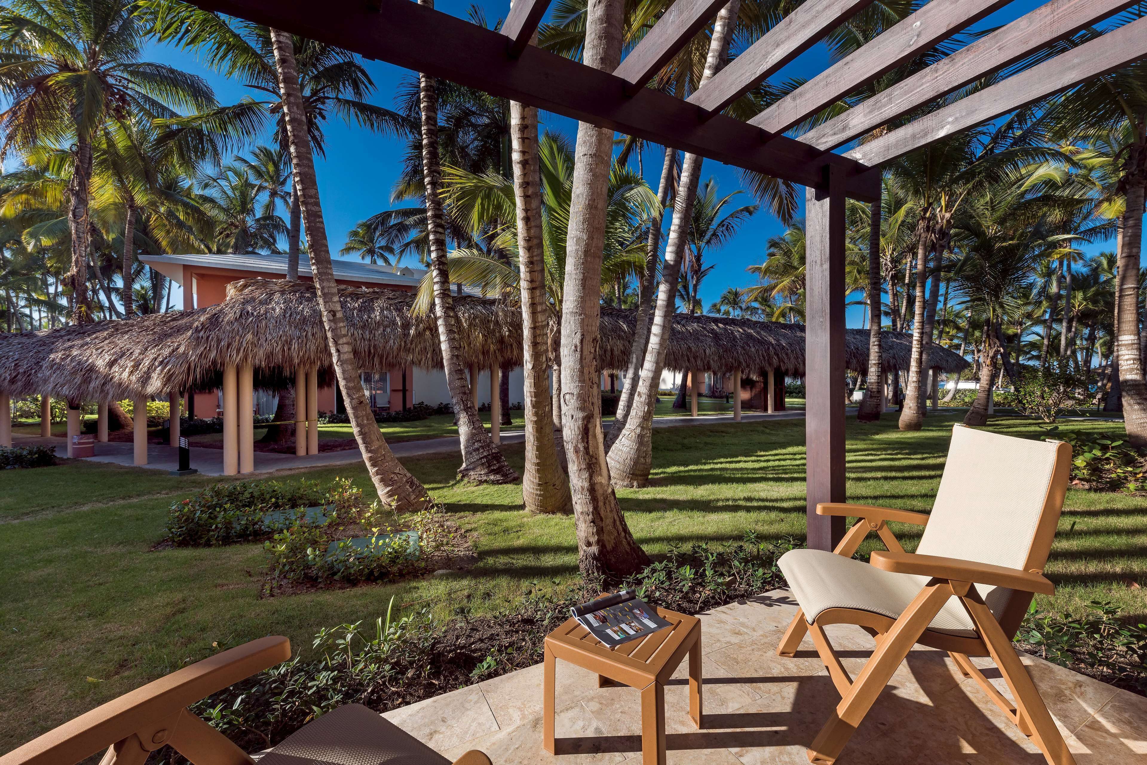 Junior Suite Garden View | Sengetøy av topp kvalitet, minibar (inkludert) og safe på rommet