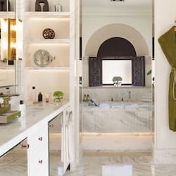 Designer toiletries, hair dryer, bathrobes, slippers