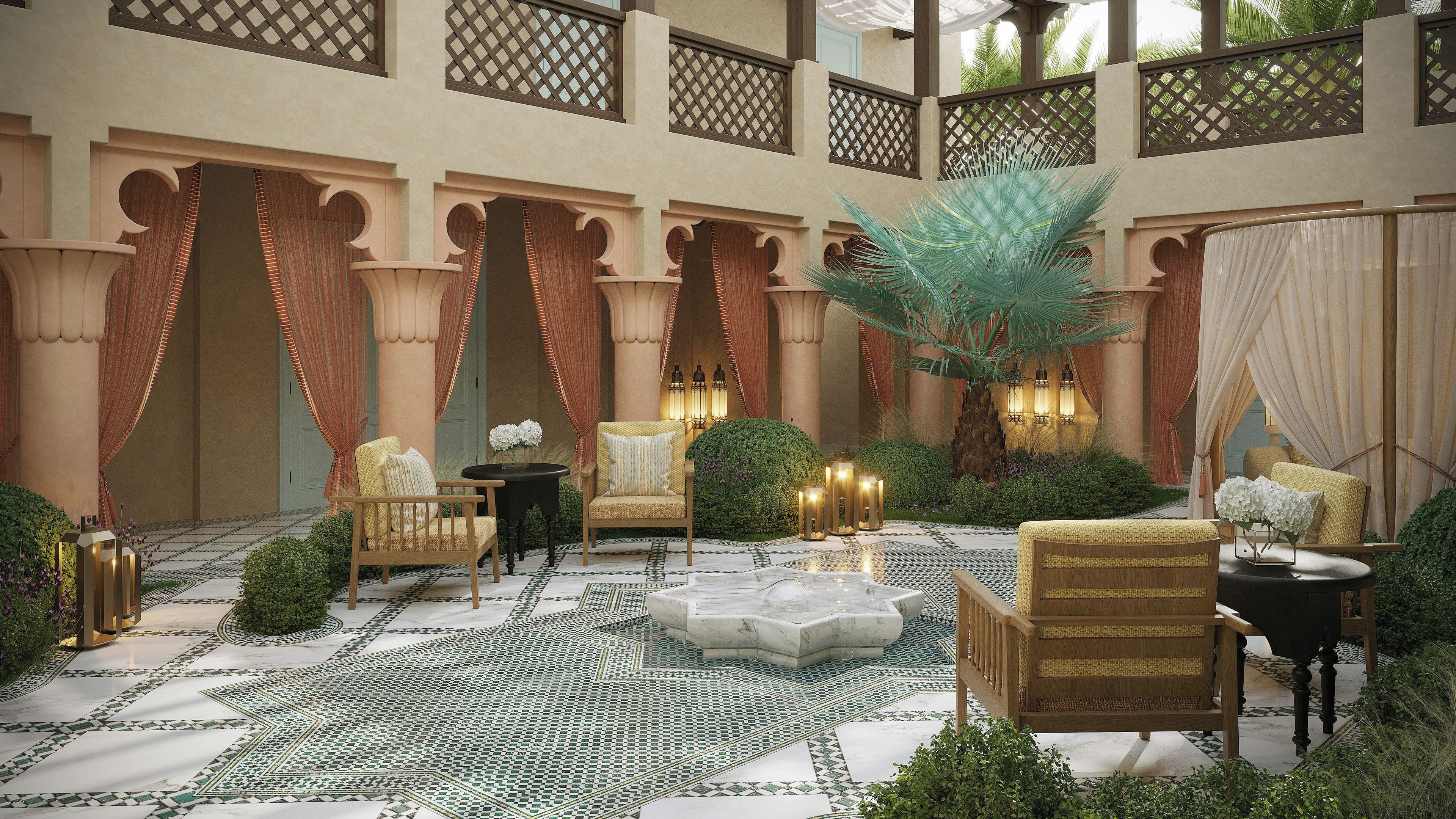 Un jardin intérieur luxueux, agrémenté de colonnes décoratives, d’espaces aménagés pour s’asseoir et d’un palmier central.
