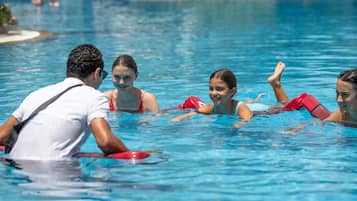 7 outdoor pools, pool umbrellas, pool loungers