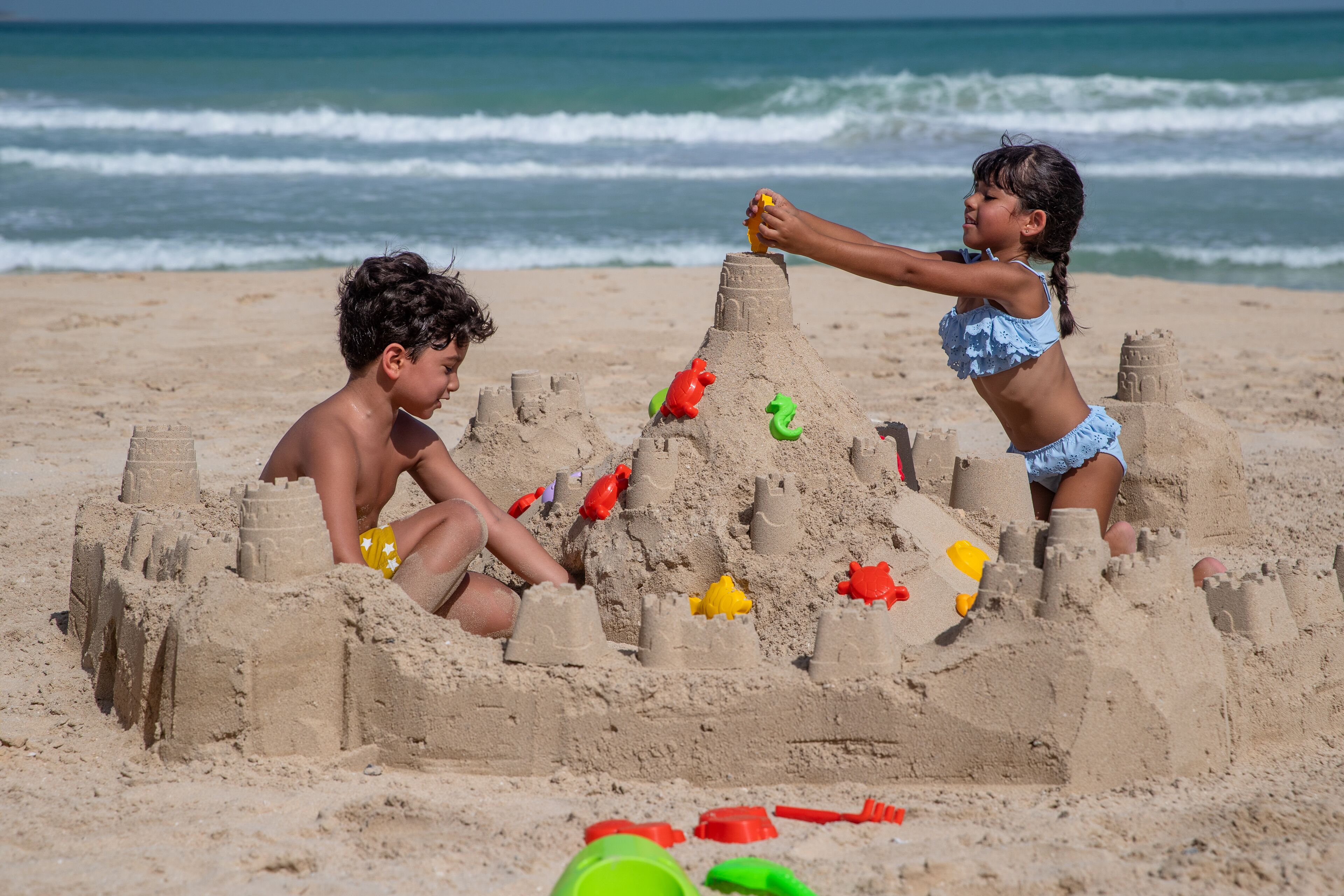 On the beach, beach cabanas, sun-loungers, beach umbrellas