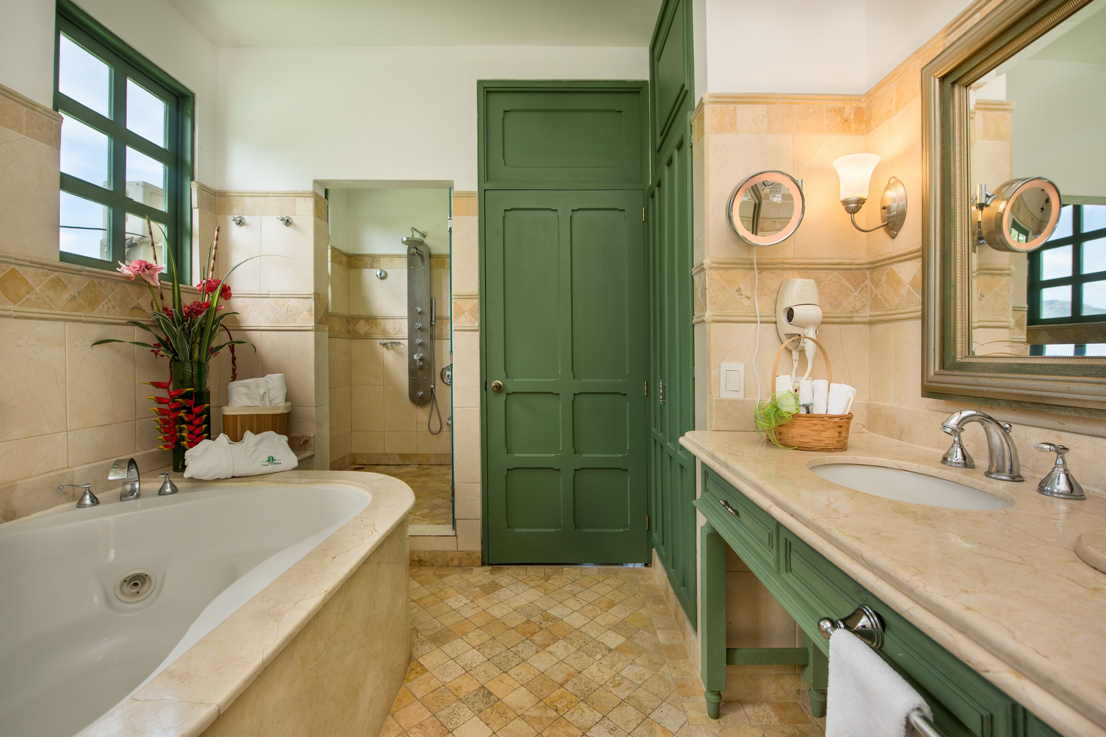 suite, 1 king bed | bathroom | combined shower/bathtub, rainfall showerhead, designer toiletries