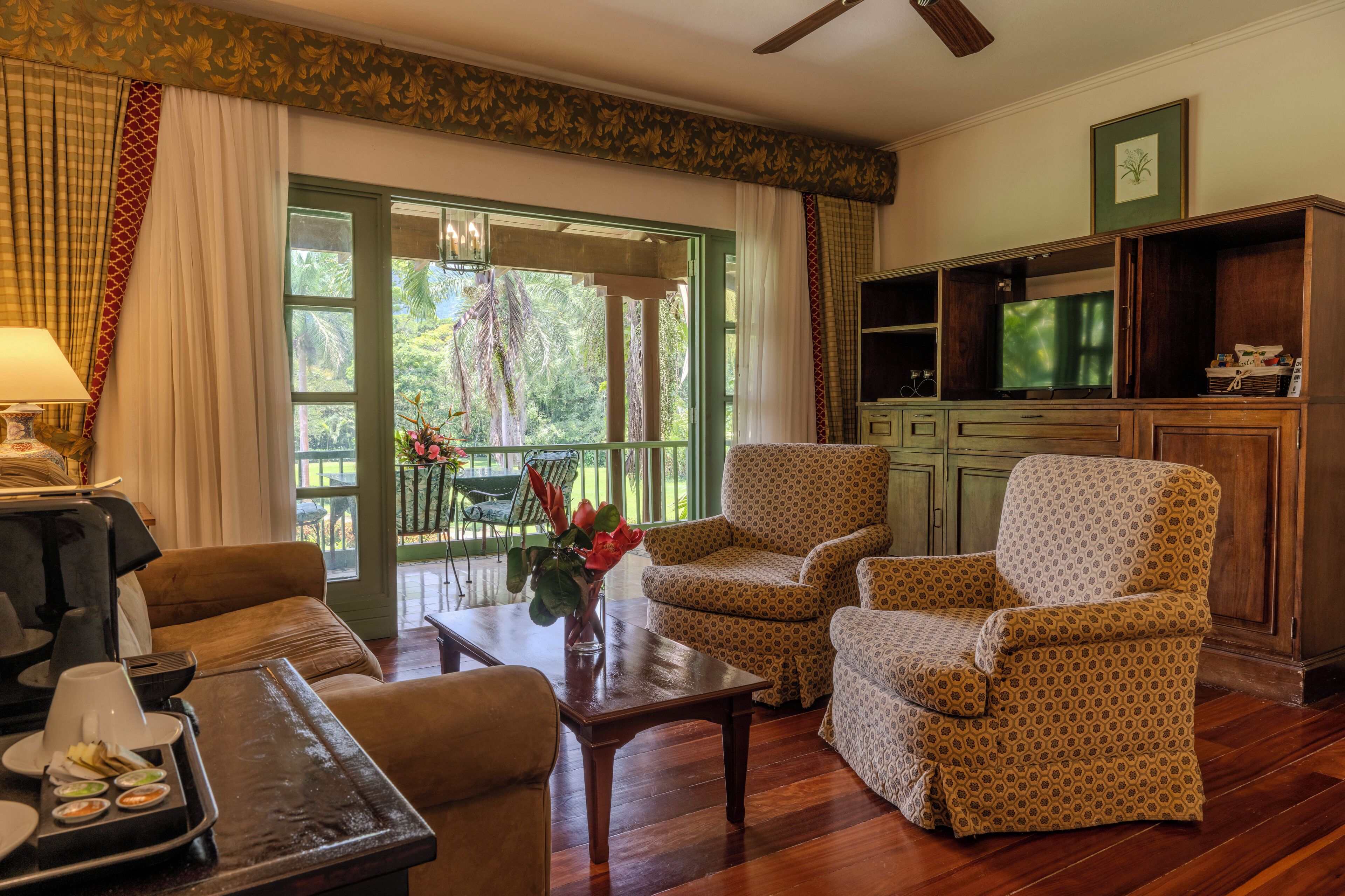 master suite heliconias | living area | 50-inch plasma tv with satellite channels, tv