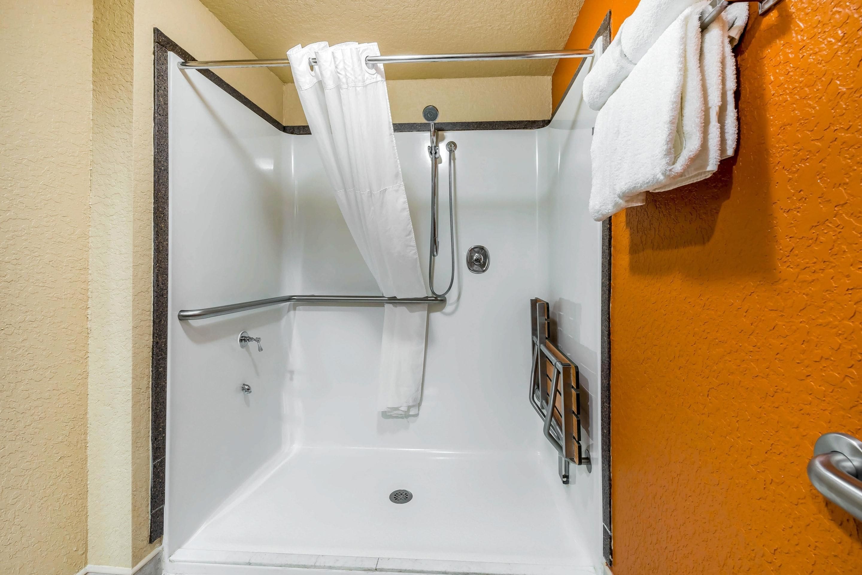 combined shower/bathtub, free toiletries, hair dryer, towels