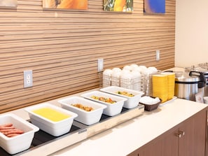 A buffet setup with various food containers and a coffee station. - Comfort Hotel Tokyo Kiyosumi Shirakawa (Tokyo)