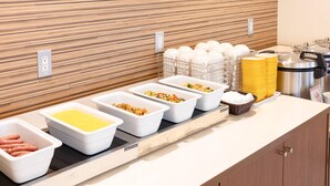A buffet setup with various food containers and a coffee station. - Comfort Hotel Tokyo Kiyosumi Shirakawa (Tokyo)