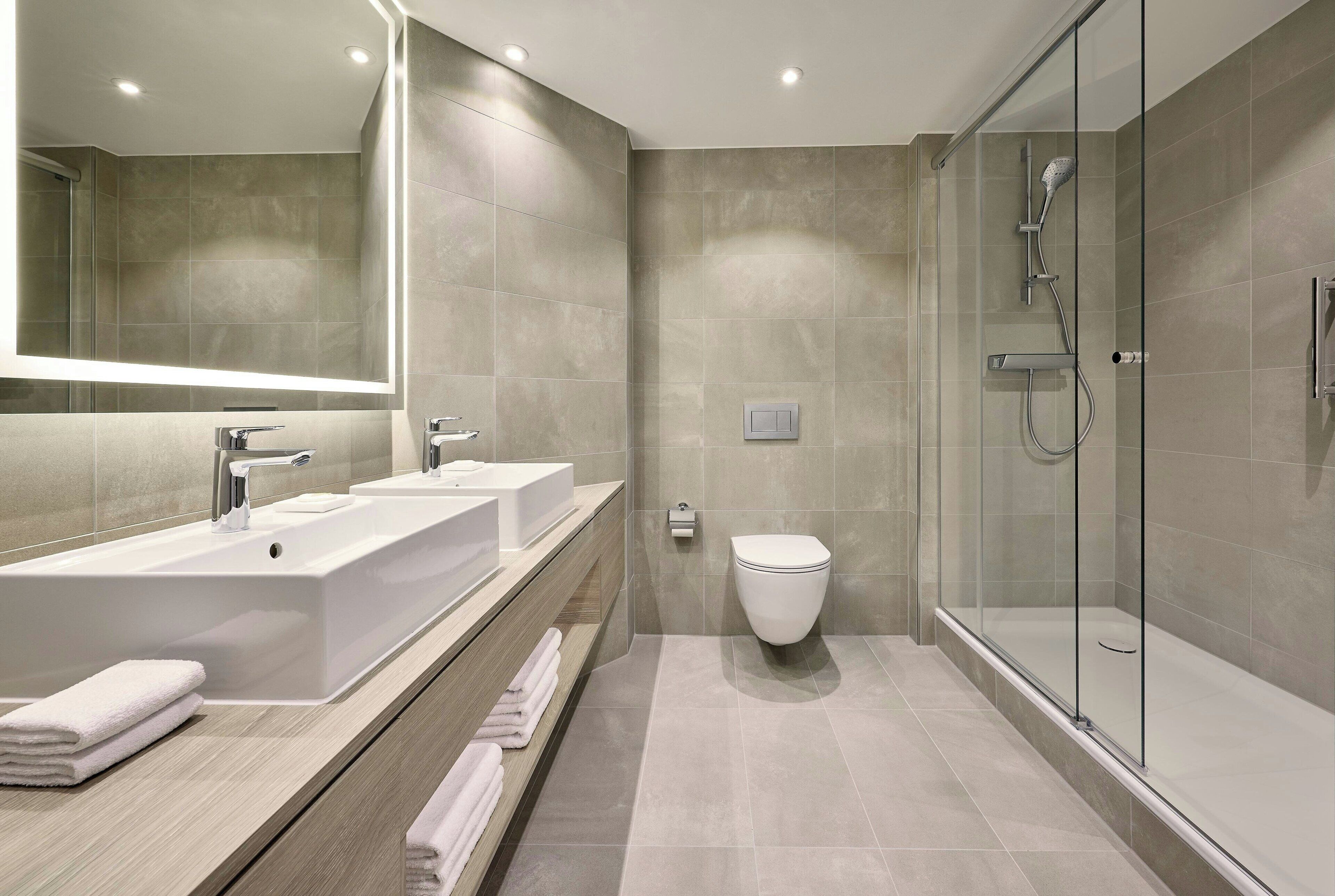 apartment, 1 king bed with sofa bed, non smoking | bathroom | shower, eco-friendly toiletries, hair dryer, towels