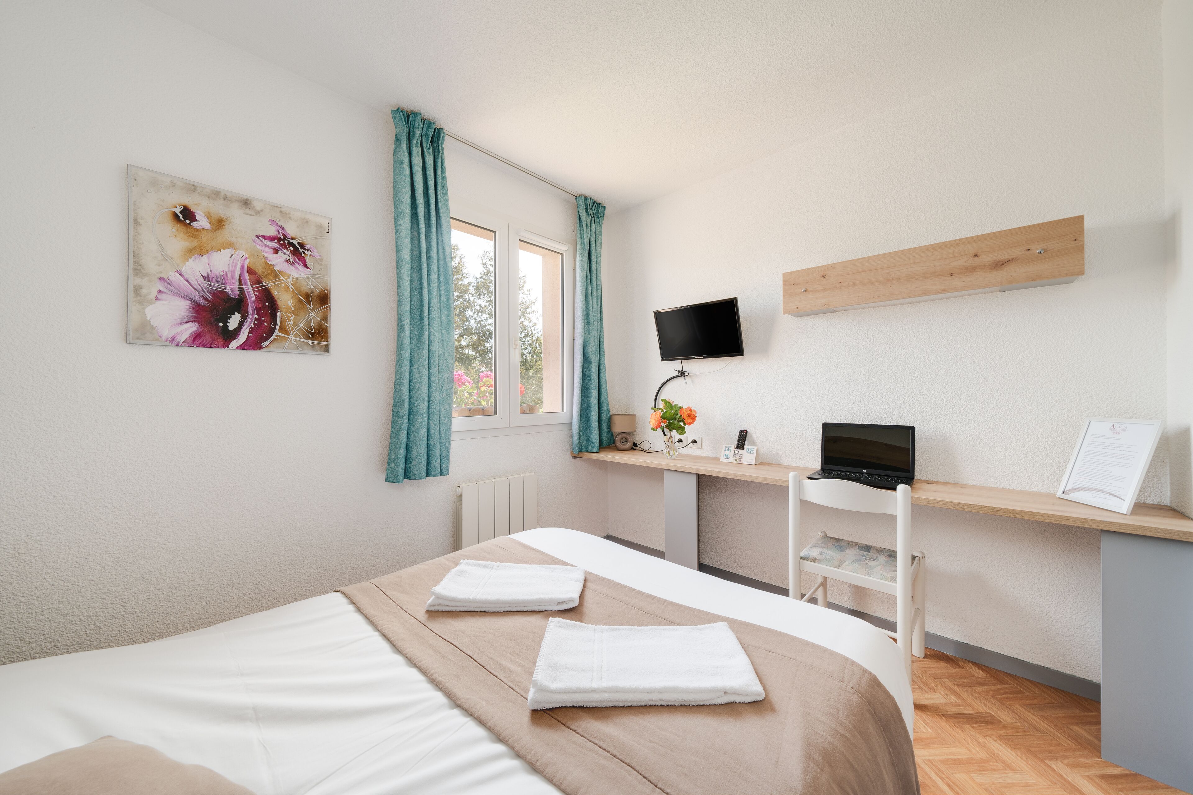 individually decorated, individually furnished, desk, blackout curtains