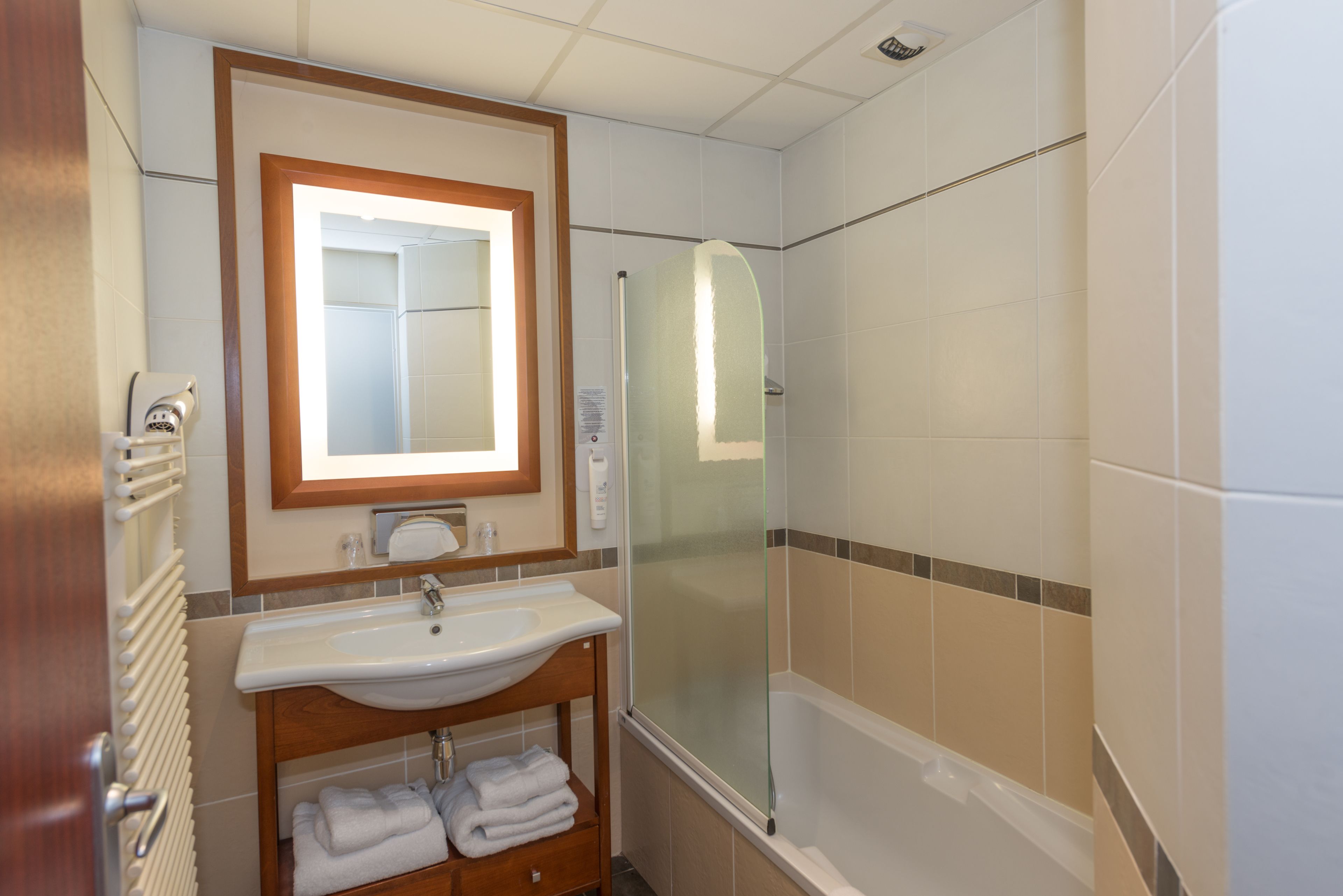 eco-friendly toiletries, hair dryer, towels