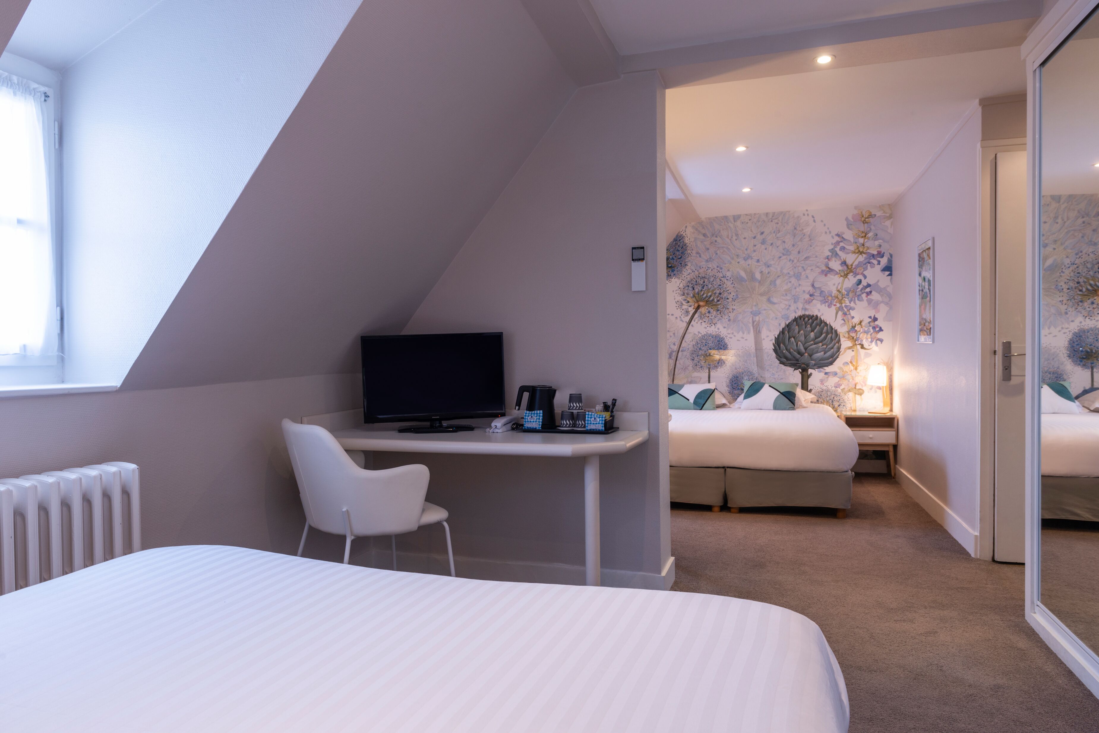 family quadruple room | in-room safe, desk, iron/ironing board, free cots/infant beds