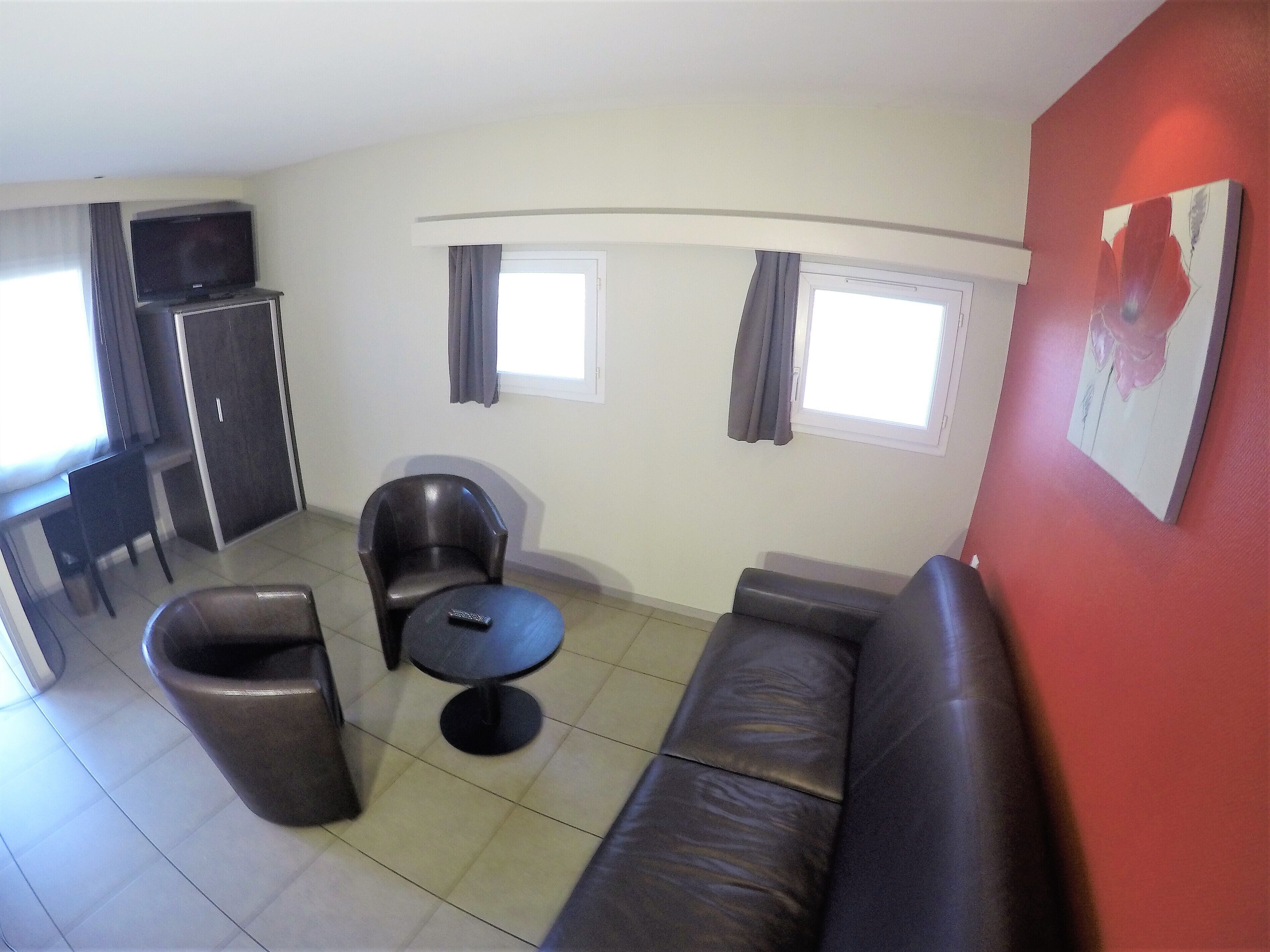 family room | in-room safe, desk, laptop workspace, soundproofing