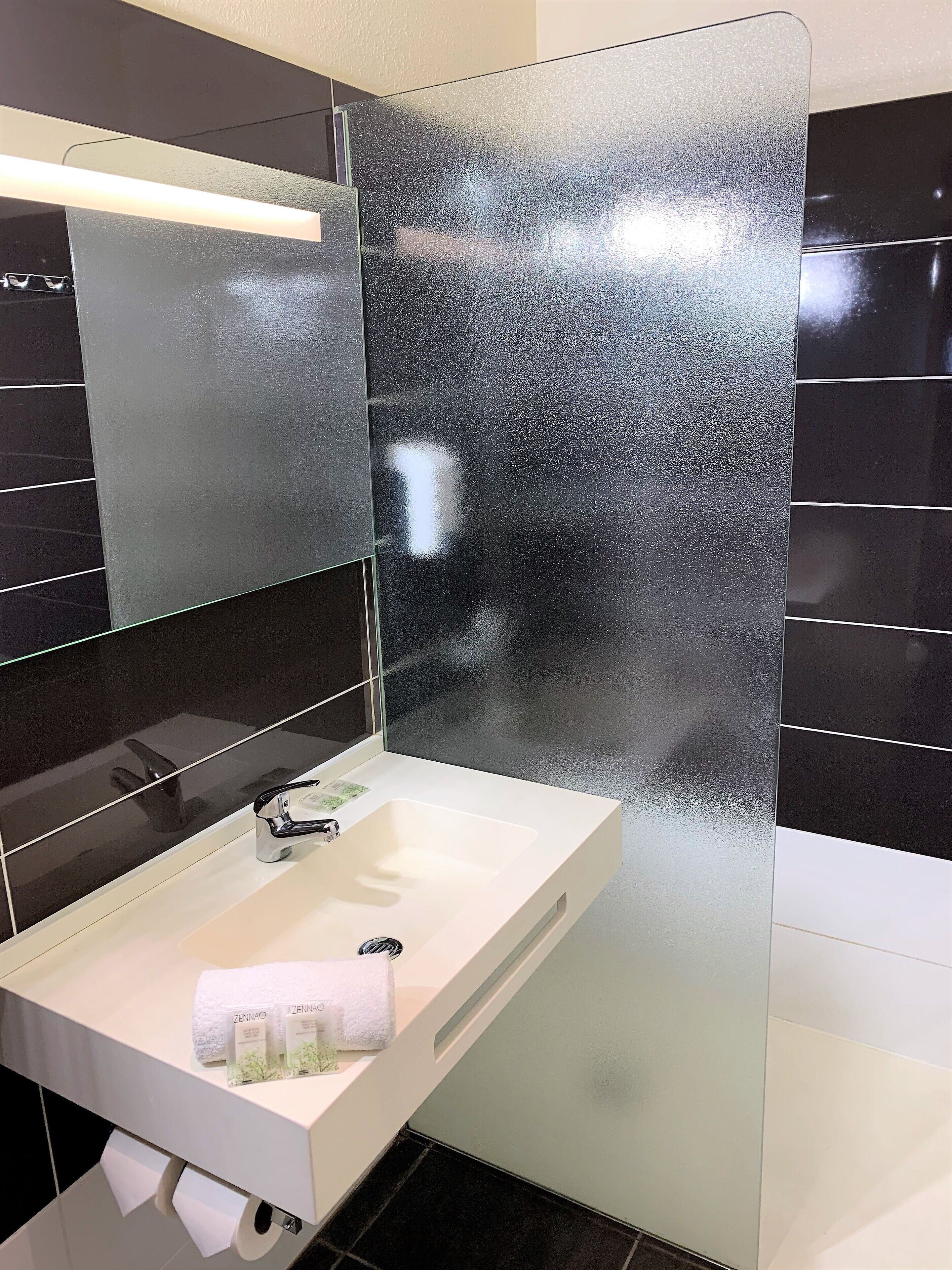 family room | bathroom | shower, hair dryer, towels