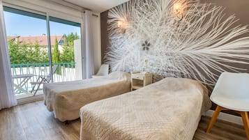 Habitación estándar con 2 camas individuales | Insonorización, tabla de planchar con plancha y cunas gratuitas