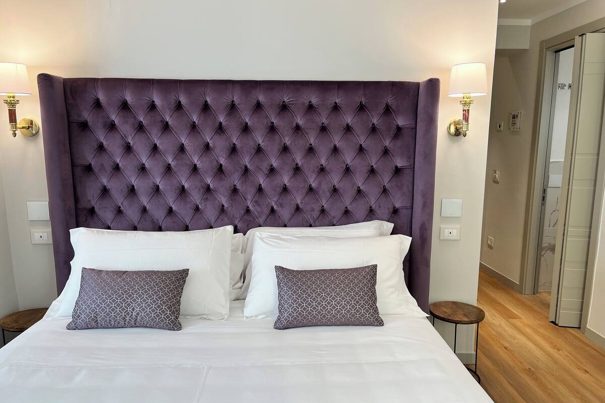 Luxe beddengoed, donzen dekbedden, pillowtop-bedden, een minibar