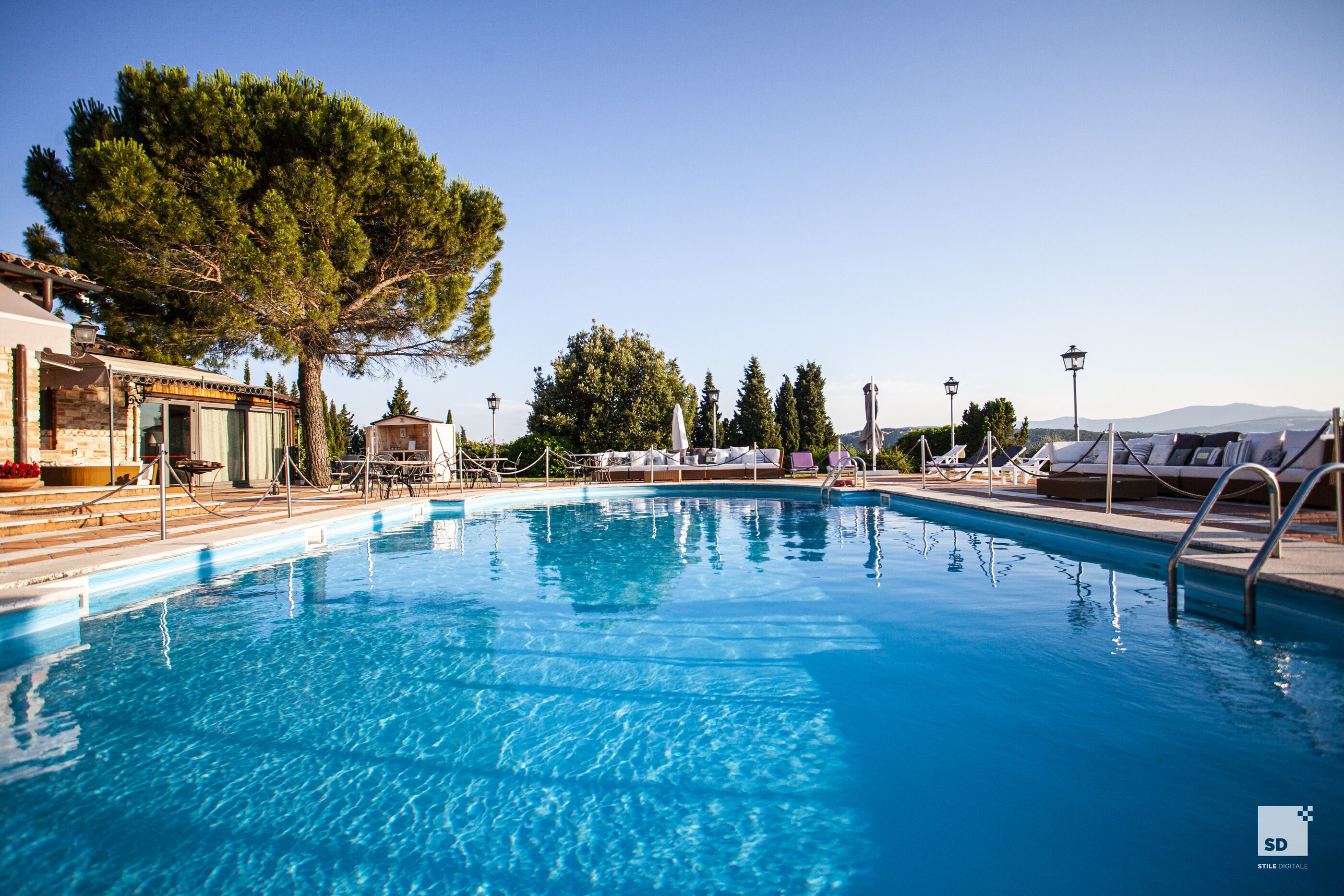 Seasonal outdoor pool, open 9:00 AM to 7:00 PM, sun loungers