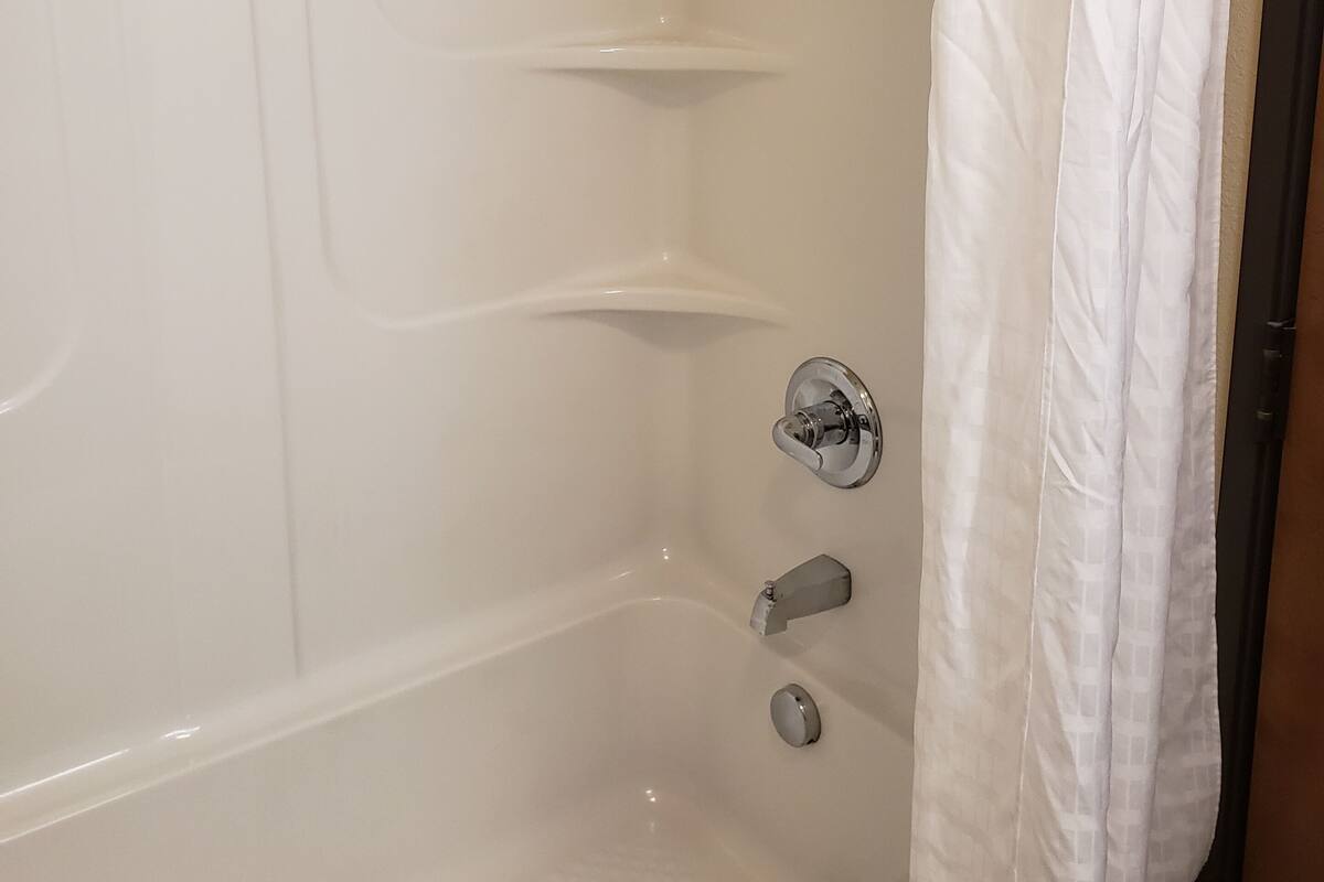 room, multiple beds | bathroom | combined shower/bathtub, free toiletries, hair dryer, towels