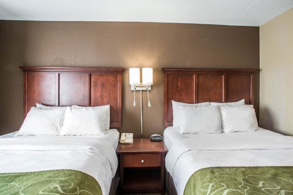 pillow-top beds, desk, laptop workspace, iron/ironing board