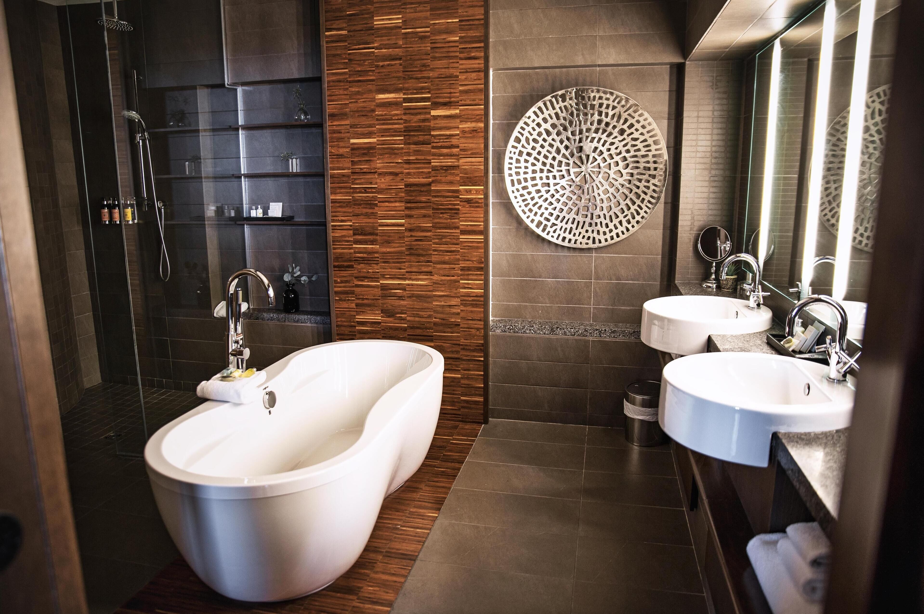 penthouse | bathroom | shower, rainfall showerhead, designer toiletries, hair dryer