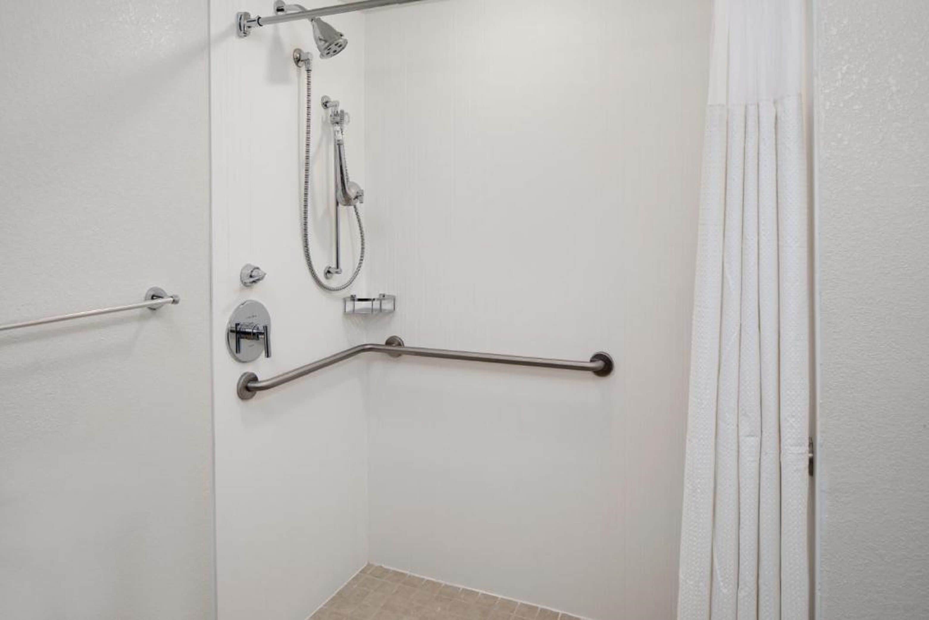 combined shower/bathtub, free toiletries, hair dryer, towels