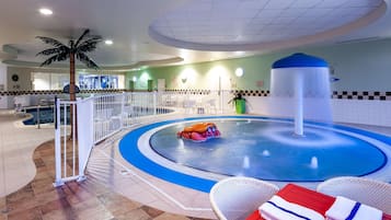 Indoor pool, open 6:00 AM to 11:00 PM, pool loungers