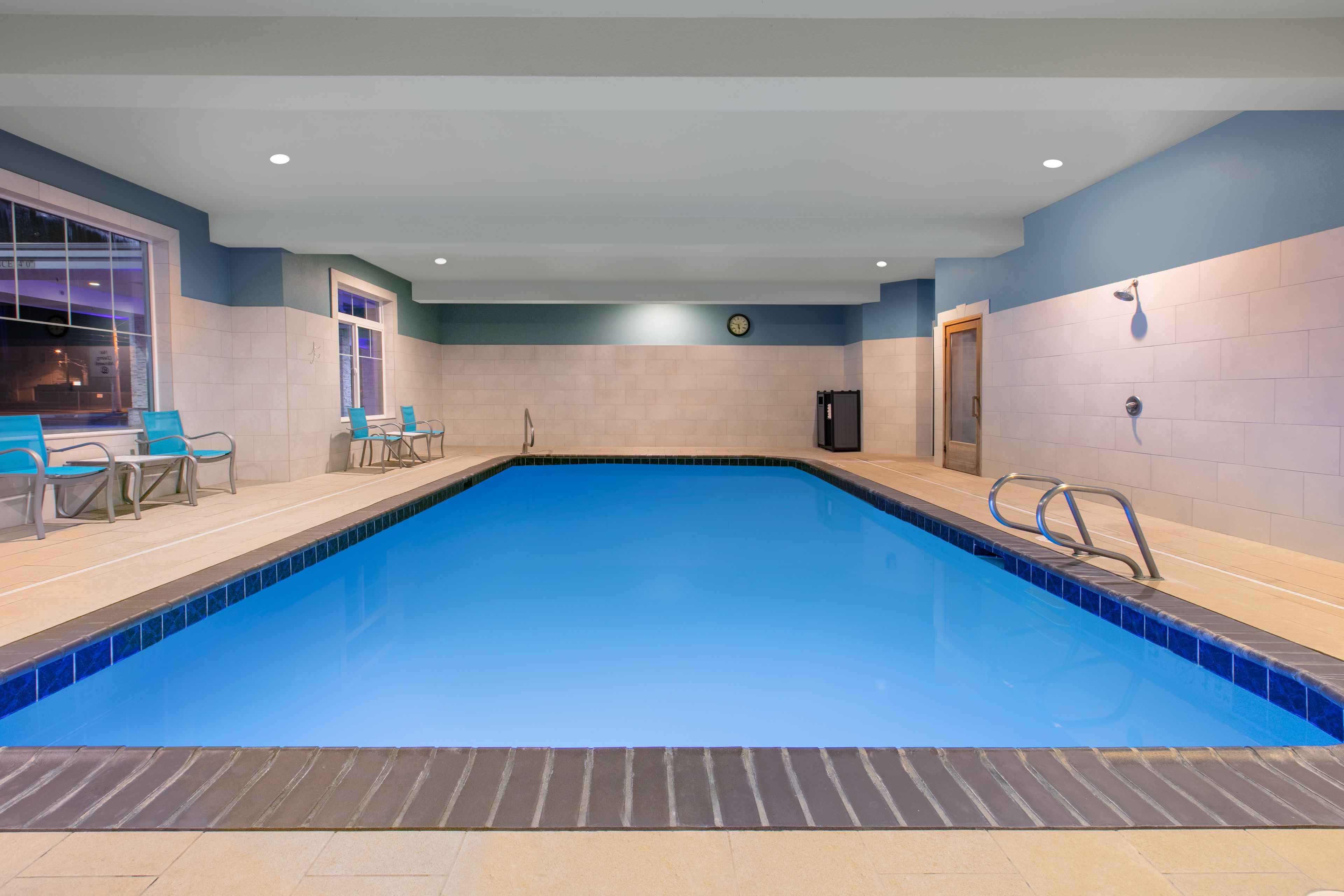 indoor pool, open 8:00 am to 10:00 pm, pool loungers