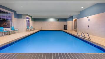 Indoor pool, open 8:00 AM to 10:00 PM, pool loungers
