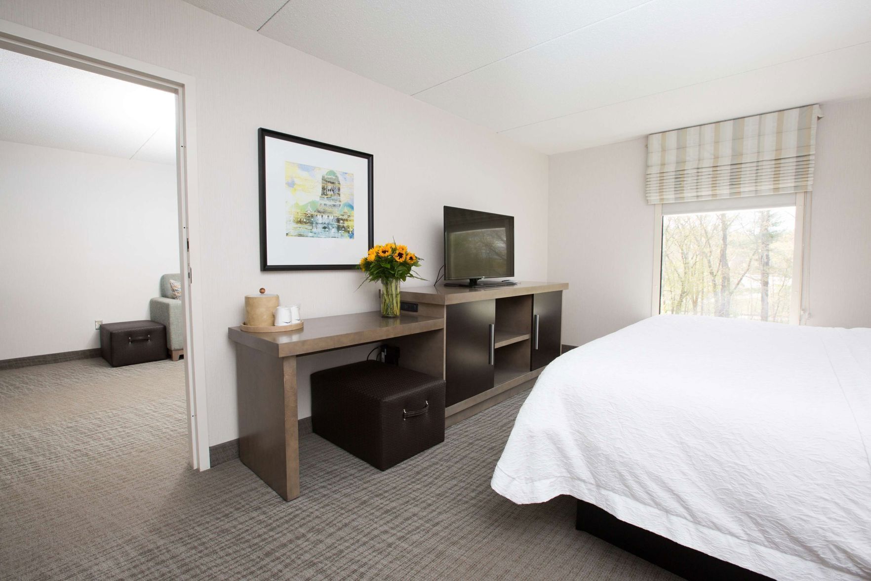 Premium bedding, desk, laptop workspace, blackout curtains