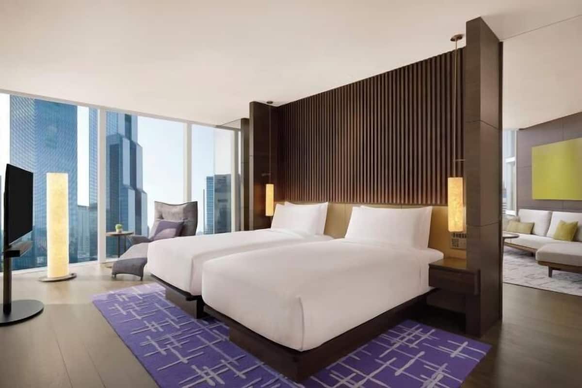 Premium bedding, down comforters, minibar, in-room safe