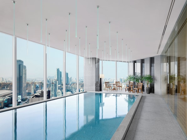 Indoor pool, open 6:00 AM to 10:30 PM, pool loungers