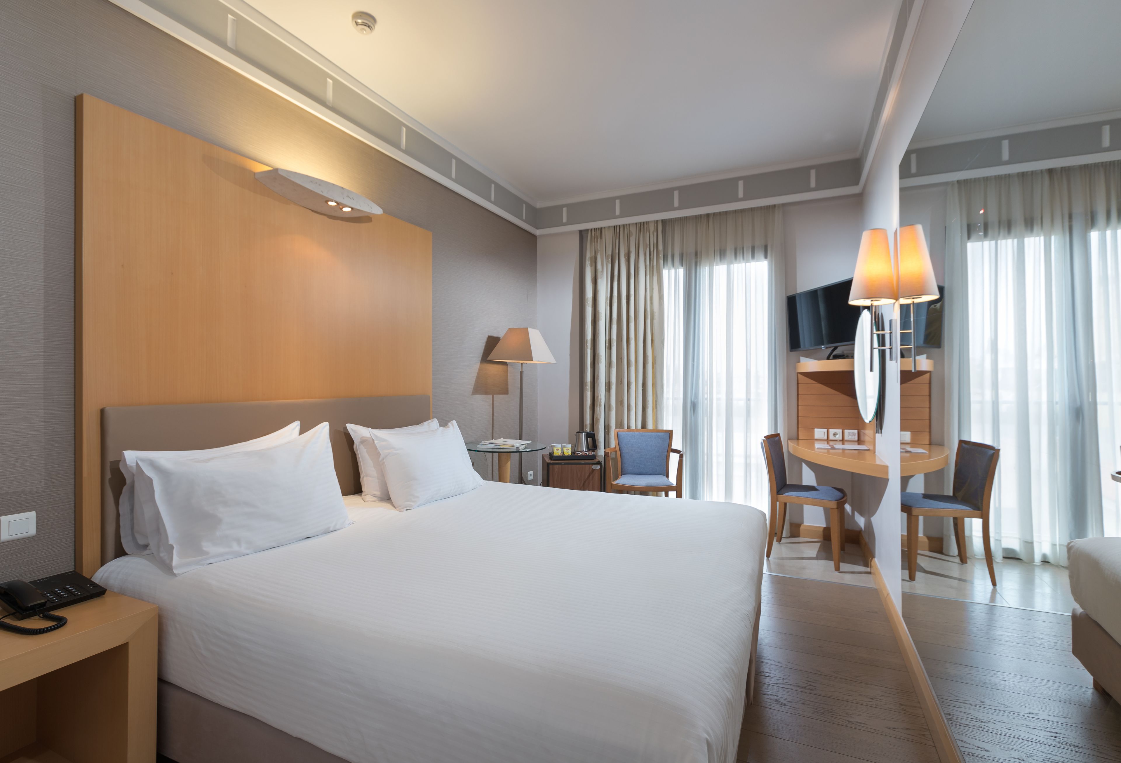deluxe room (acropolis or city view) | 2 bedrooms, hypo-allergenic bedding, pillow-top beds, in-room safe
