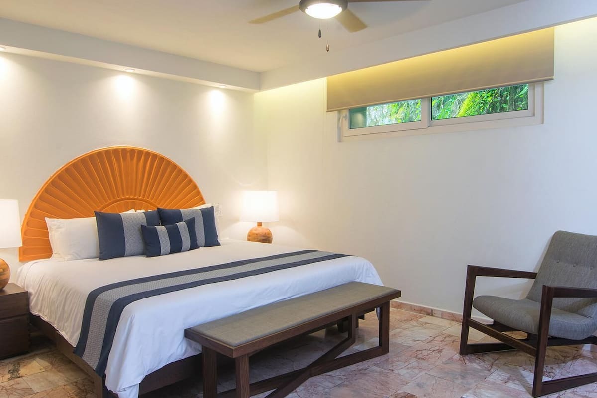 Down duvets, memory-foam beds, in-room safe, blackout curtains