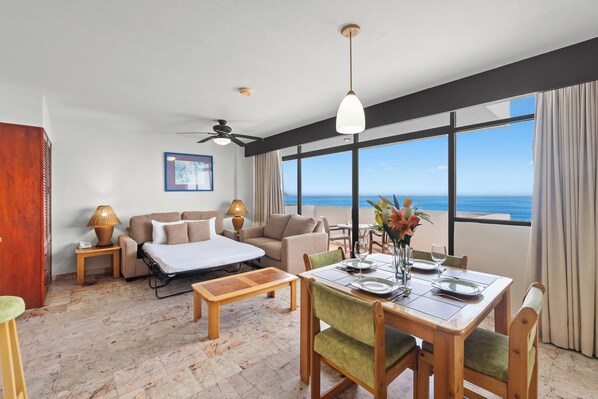 1 Bedroom Apartment with Large Terrace Oceanfront | Living area | 42-inch LCD TV with cable channels, TV, iPod dock