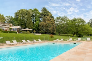 Seasonal outdoor pool, open 8:00 AM to 8:00 PM, free pool cabanas