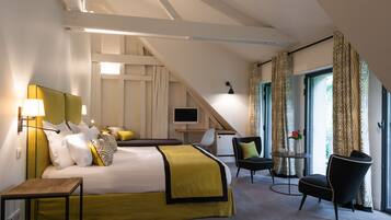 Luxe beddengoed, een minibar, een kluis op de kamer