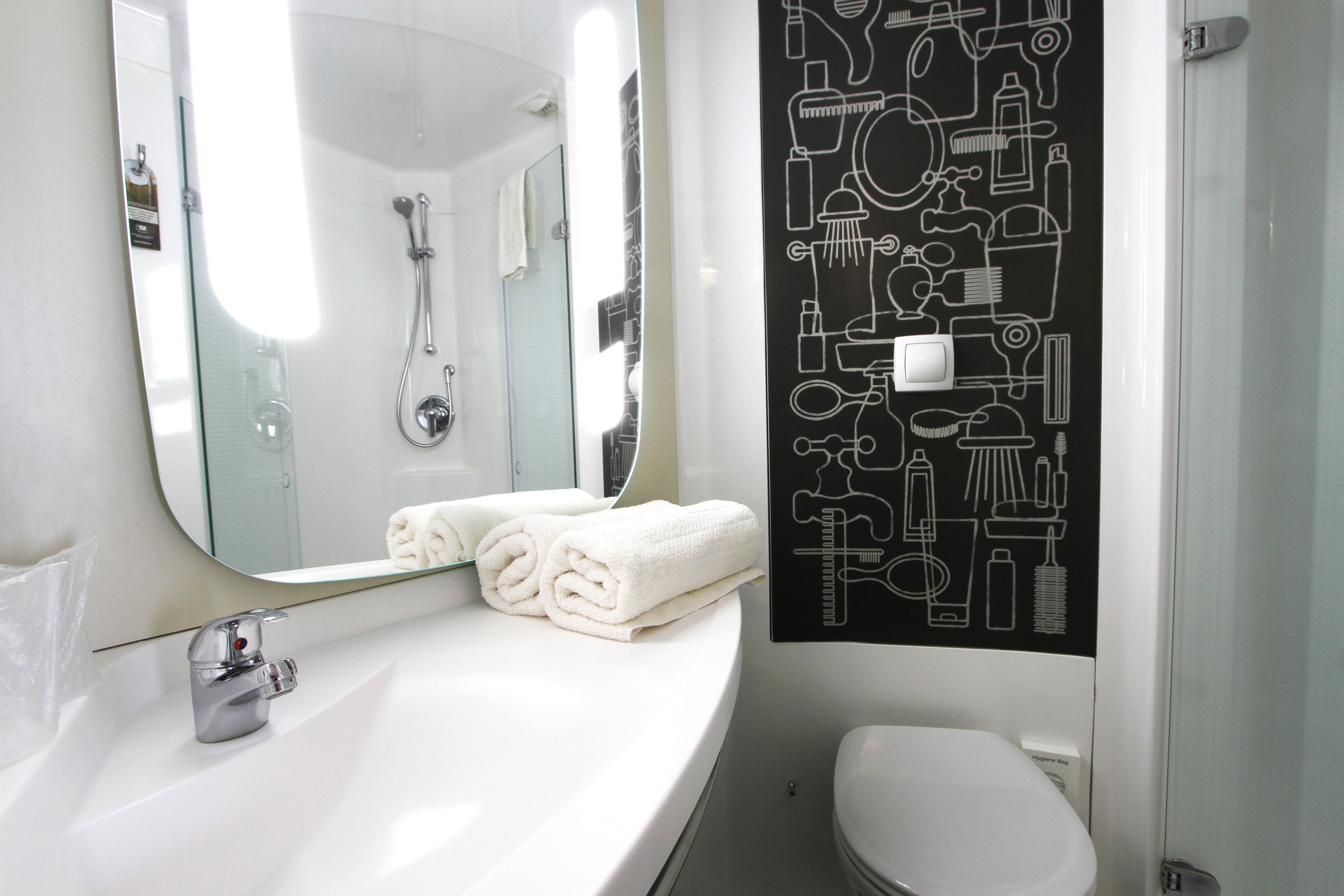 shower, eco-friendly toiletries, hair dryer, towels