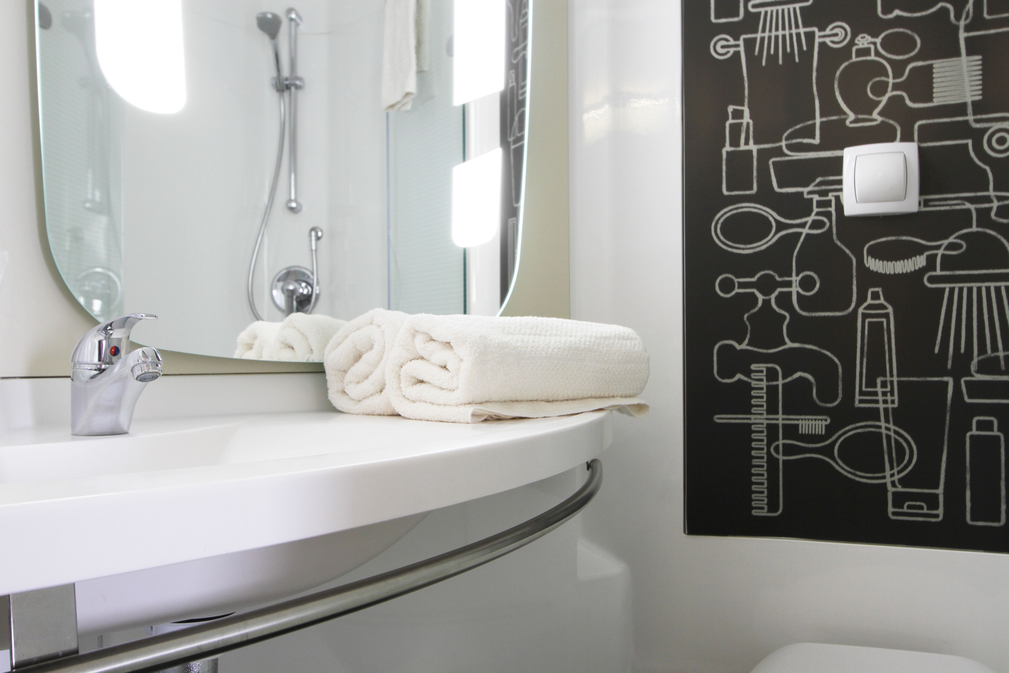 shower, eco-friendly toiletries, hair dryer, towels